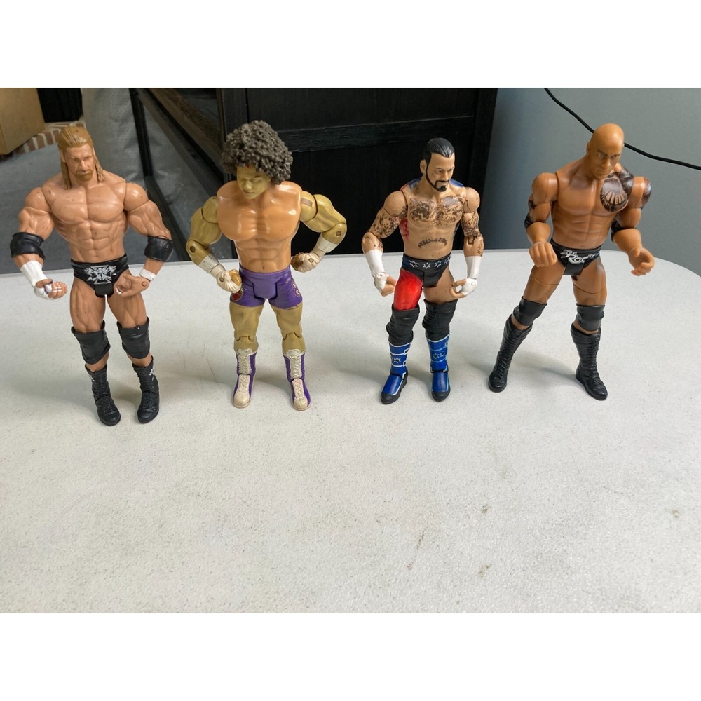 WWE Mattel Wrestling Action Figures Lot Of 4 CM Punk Rock Triple H Carlito